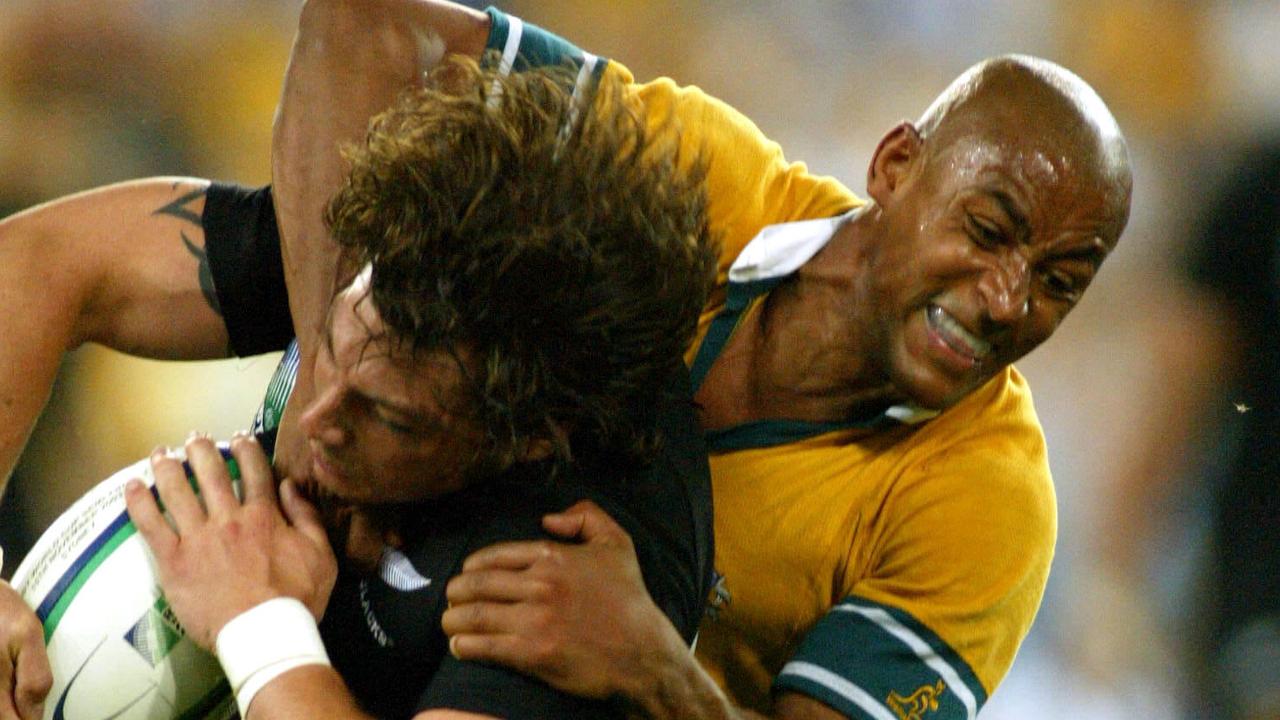 George Gregan tackles Byron Kelleher in the 2003 Rugby World Cup semifinal.