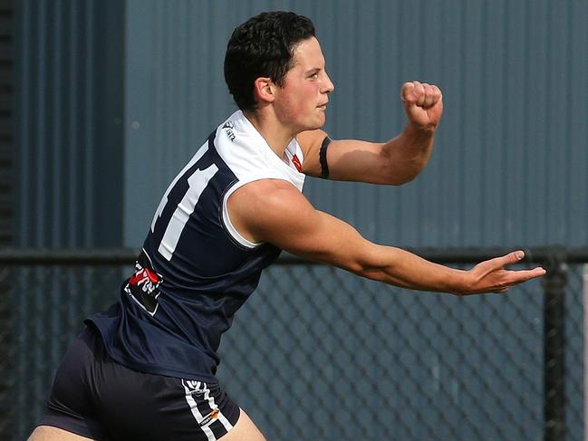 Ballarat FL footy: Melton South v Bacchus Marsh: Riley Theo of Melton South handpassesSaturday, May 1, 2021, in Melton, Victoria, Australia. Picture: Hamish Blair