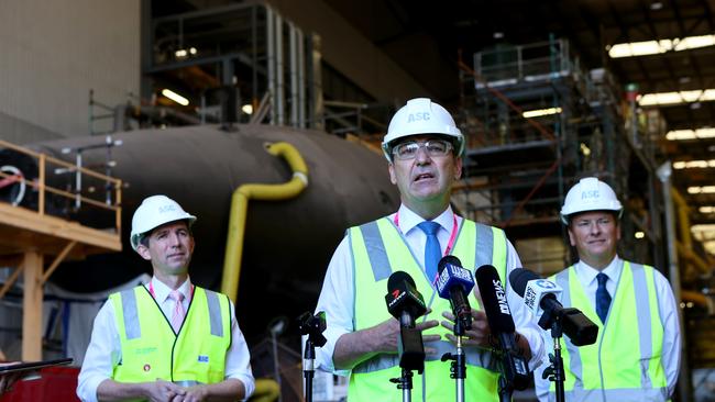 Finance Minister Simon Birmingham, Premier Steven Marshall and ASC chairman Bruce Carter at ASC on September 17, after the AUKUS nuclear submarine announcement. Picture Kelly Barnes