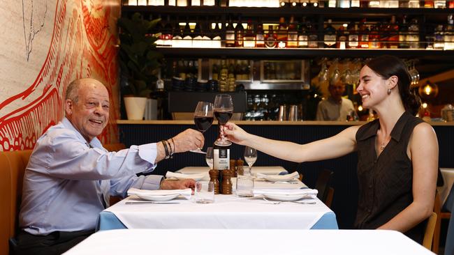 Owner Bill Mougios toasts to the new restaurant before it opens next Monday. Picture: Jonathan Ng