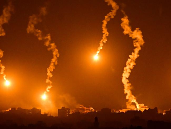 Flares dropped by Israeli forces above the Palestinian enclave amid ongoing battles between Israel and the Palestinian Hamas movement. Picture: AFP