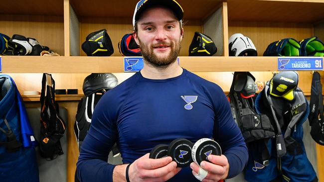 Walker and his three pucks. Photo by Scott Rovak/NHLI via Getty Images