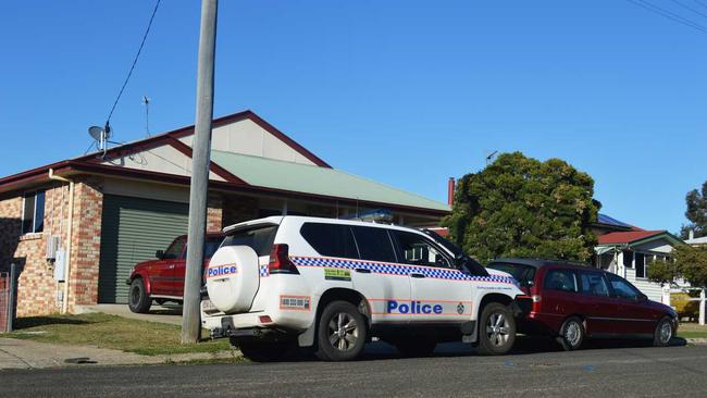 Warwick police officers wait outside the scene of the alleged homicide. . Picture: Tessa Flemming