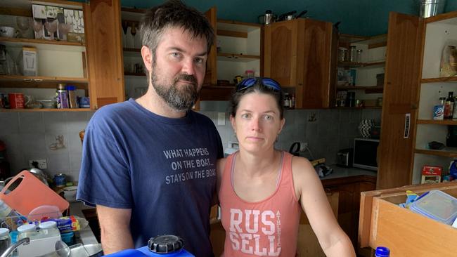 Terania Street residents Jesse and Denise Perkins fear a shortage of tradespeople will make it very hard for them to get their flood ravaged North Lismore home ready to live in. Picture: Stuart Cumming