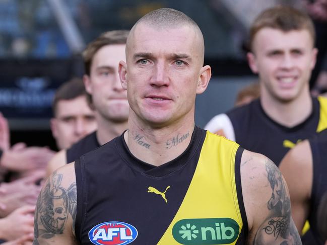 MELBOURNE, AUSTRALIA - JUNE 30: Dustin Martin of the Tigers runs out with the team during the round 16 AFL match between Richmond Tigers and Carlton Blues at Melbourne Cricket Ground, on June 30, 2024, in Melbourne, Australia. (Photo by Daniel Pockett/Getty Images)