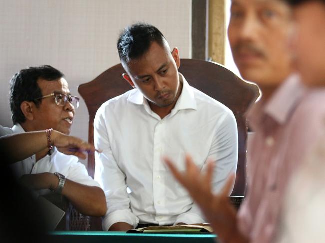 William Cabantog listening to doctors, who did an assessment and recommended him to get rehabilitation during the trial at Denpasar District Court. Picture: Lukman S. Bintoro