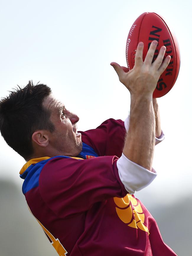 Ex-Saint Steve Milne marks for Tyabb. Picture: Derrick den Hollander