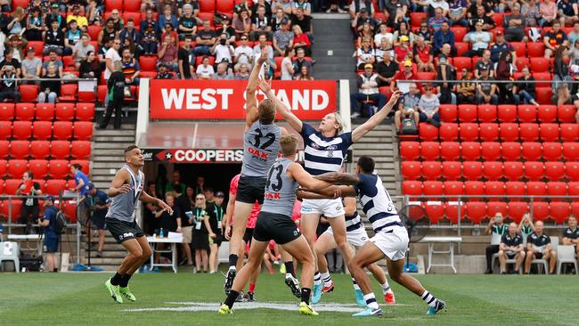 Dougal Howard of the Power and Mark Blicavs of the Cats contest the first “tip off” during the AFLX tournament. Picture: Michael Willson/AFL Media/Getty Images)