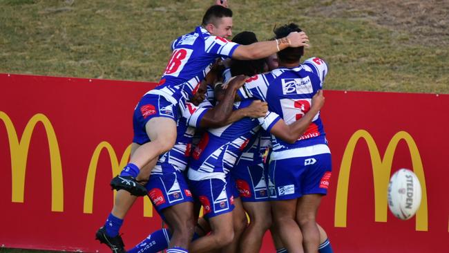 Brothers players celebrate their nailbiting extra-time preliminary final victory over the Jets at the North Ipswich Reserve. Picture: Bruce Clayton