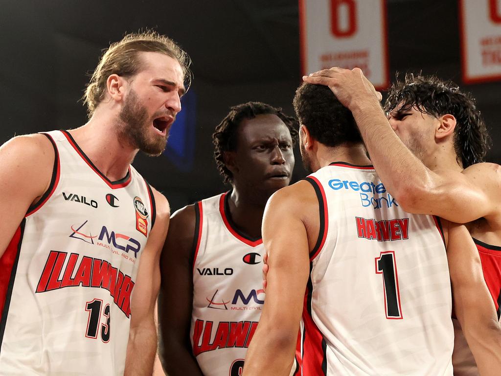 Tyler Harvey, Wani Swaka Lo Buluk, Sam Froling and William Hickey of the Hawks celebrate winning game two. Picture: Getty Images