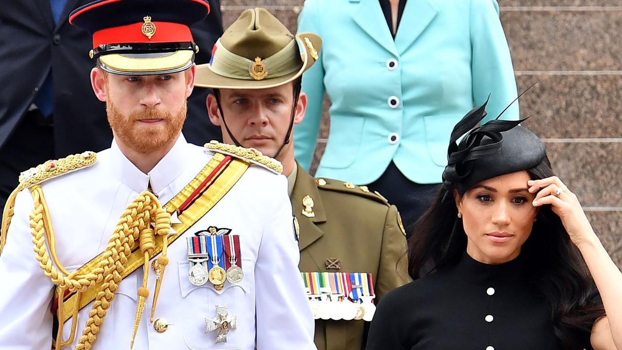 Prince Harry with wife Meghan, Duchess of Sussex arrive for the official opening of the refurbished ANZAC Memorial at Hyde Park in Sydney. Picture: Saeed KHAN / AFP