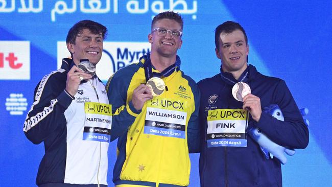 Williamson won Australia’s first gold of the swimming world titles. (Photo by Oli SCARFF / AFP)