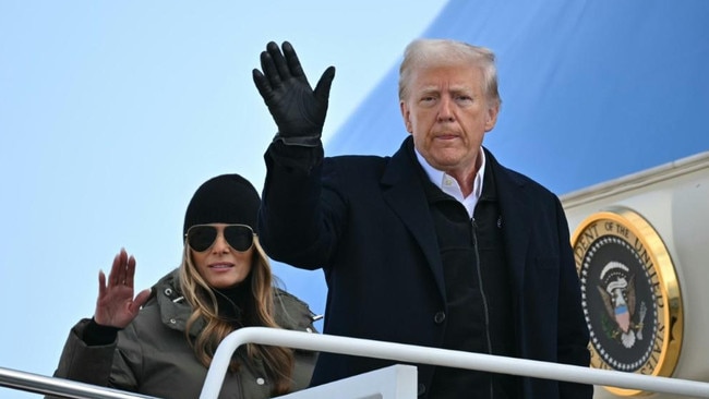 US President Donald Trump and First Lady Melania Trump board Air Force One at Joint Base Andrews in Maryland to travel to North Carolina. Picture: AFP