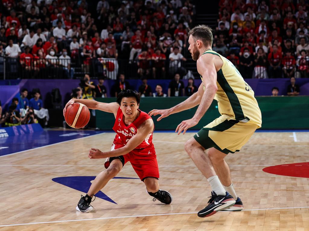 Yuki Togashi #2 of Japan drives to the basket against Nick Kay #15 of Australia. Picture: Getty Images