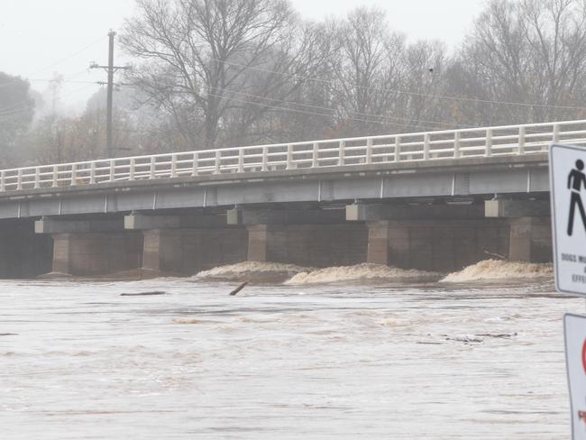 Floodwaters at Perth, Tasmania. Picture: BRUCE MOUNSTER