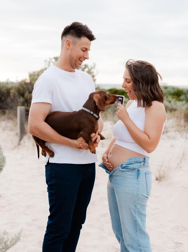 Laura and Max Sharrad, with dog Alfie, when they announced they were expecting a baby. Picture: Mish at Olive Leaf Studio