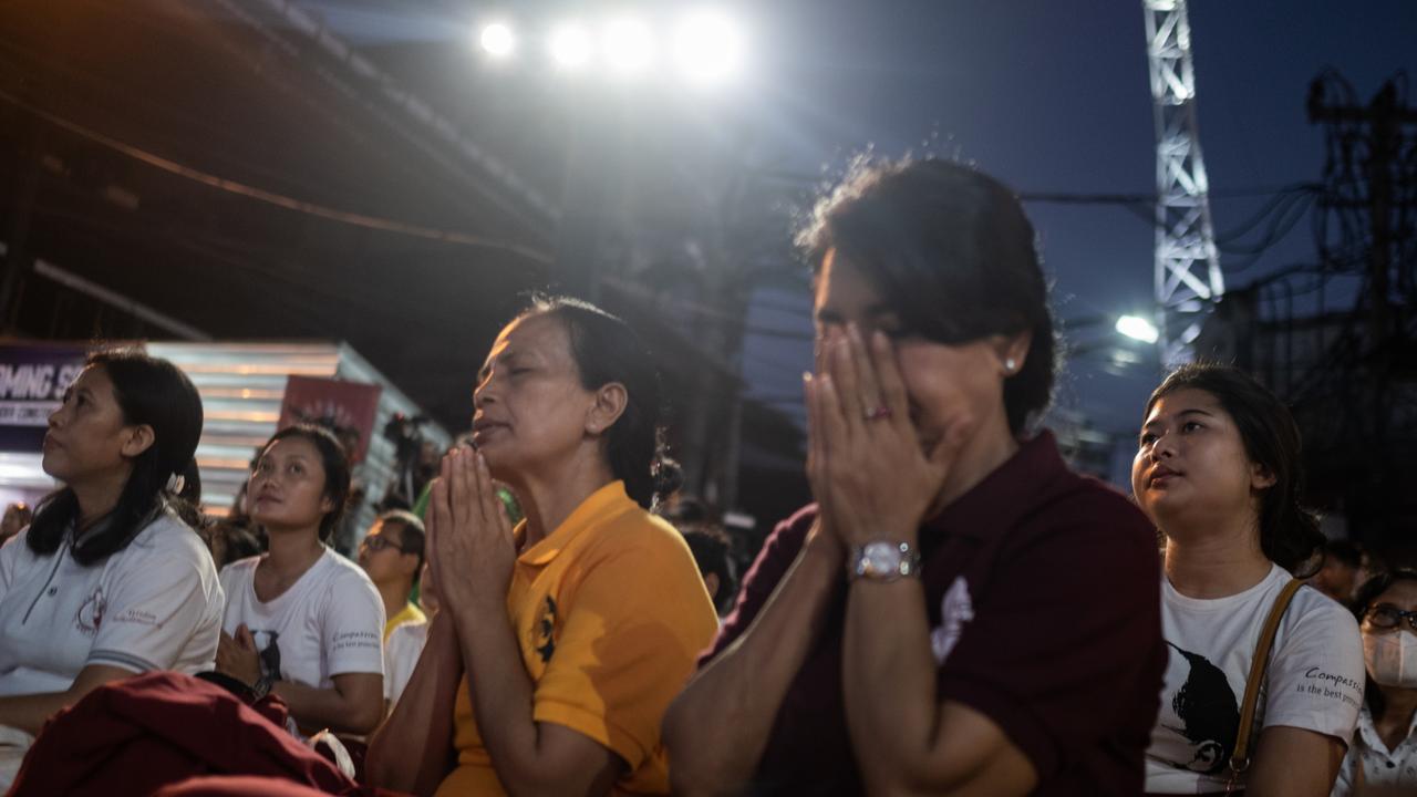 Attendees were so upset they left the service. Picture: Agung Parameswara / Getty Images