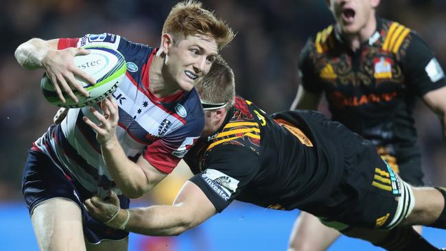 HAMILTON, NEW ZEALAND - MAY 21: Nic Stirzaker of the Rebels is tackled by Sam Cane of the Chiefs during the round 13 Super Rugby match between the Chiefs and the Rebels at FMG Stadium on May 21, 2016 in Hamilton, New Zealand. (Photo by Phil Walter/Getty Images)