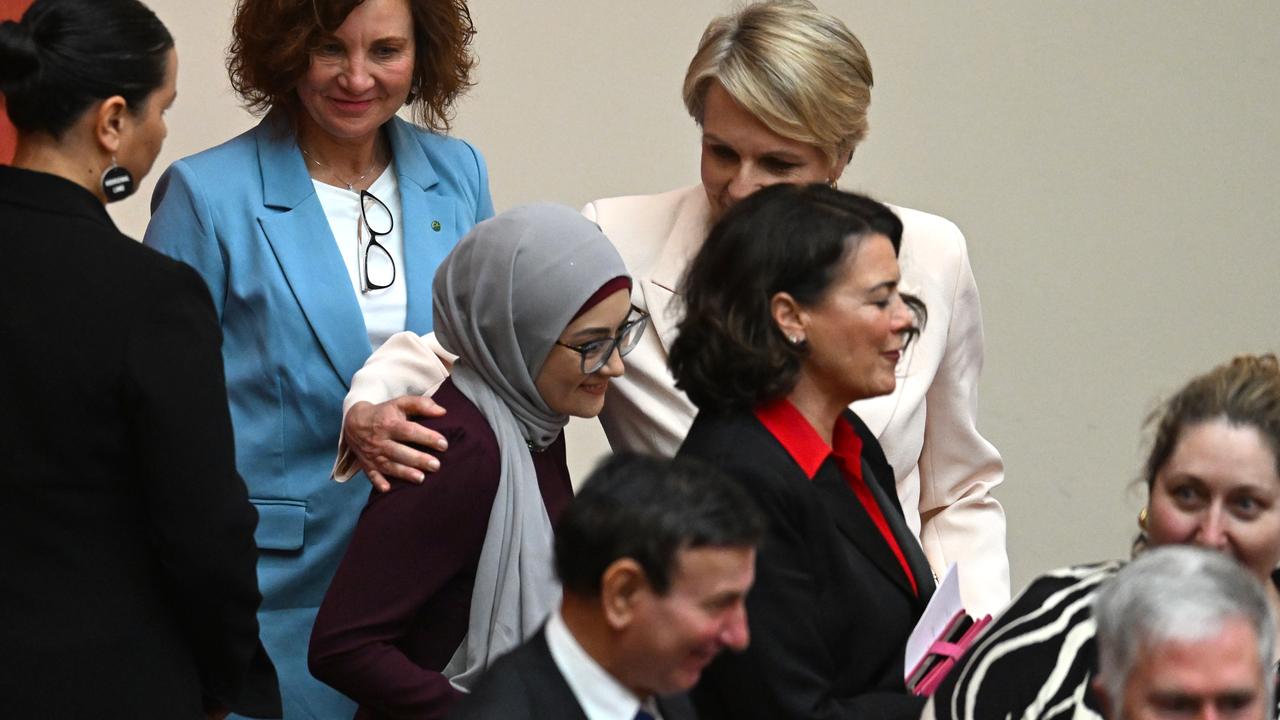 Labor Senator Fatima Payman is embraced by Environment Minister Tanya Plibersek during a parliament event on Monday. Picture: AAP Image/Lukas Coch