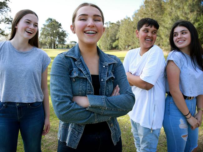 Teenagers Veronica Williams, 15, Gigi Dooley, 14, Zachary Braithwaite, 15, and Estrella Vega, 14, are proud to show off their beautiful smiles. Picture: Toby Zerna