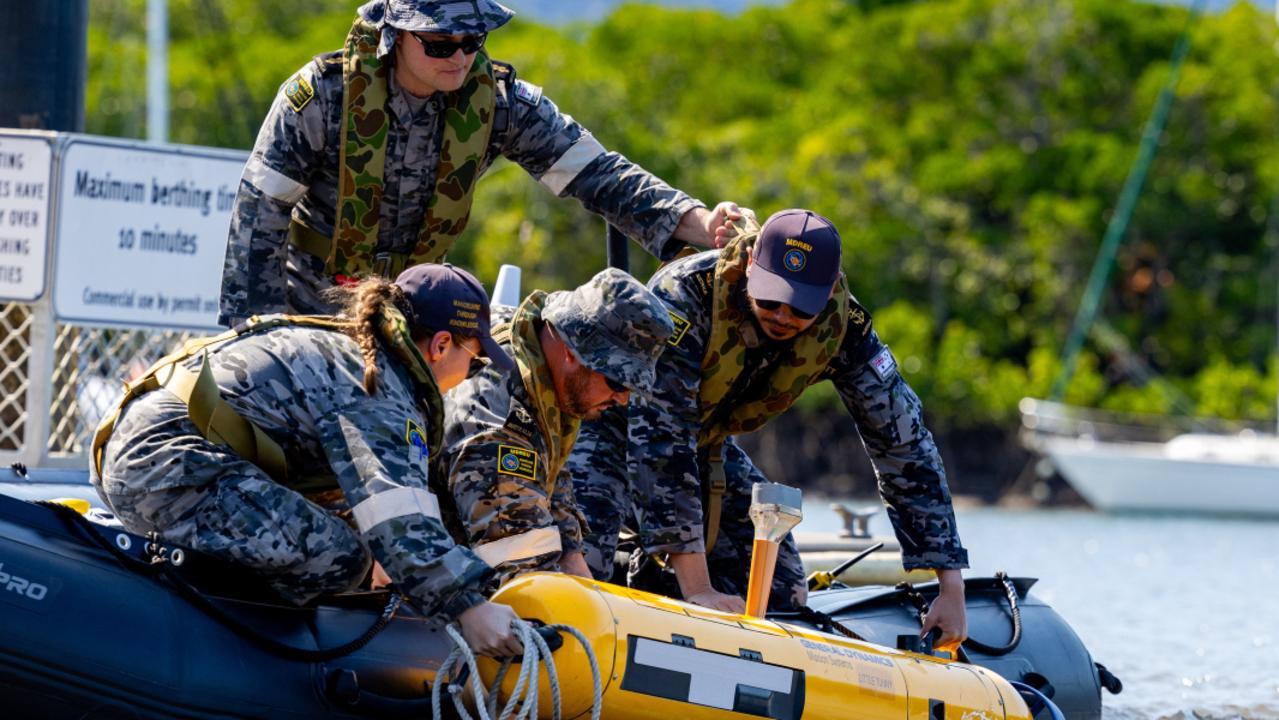 Royal Australian Navy sailors lower a Bluefin-9 autonomous underwater vehicle into Cairns Inlet near HMAS Cairns as part of Exercise Austral Shield 2024. Picture: CPL Michael Currie.