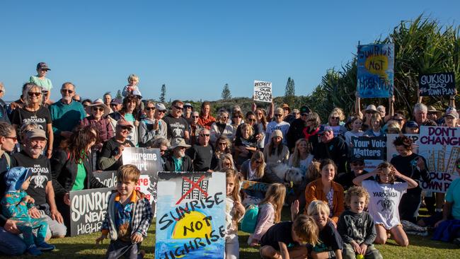 Sunshine Coast community members meet at the Yaroomba headland to talk about the appeal launched by Development Watch over a decision by the Planning and Environment Court to approve a controversial development on the Yaroomba coastline.