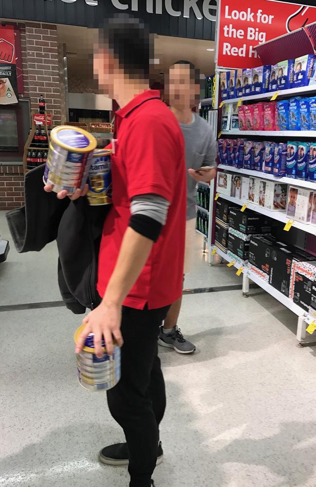 Teams of shoppers strip baby formula from shelves.