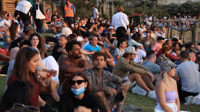 The majority of people in Biddigal Reserve in Bondi on Sunday were unmasked and not socially distancing. Picture: OnScene Bondi