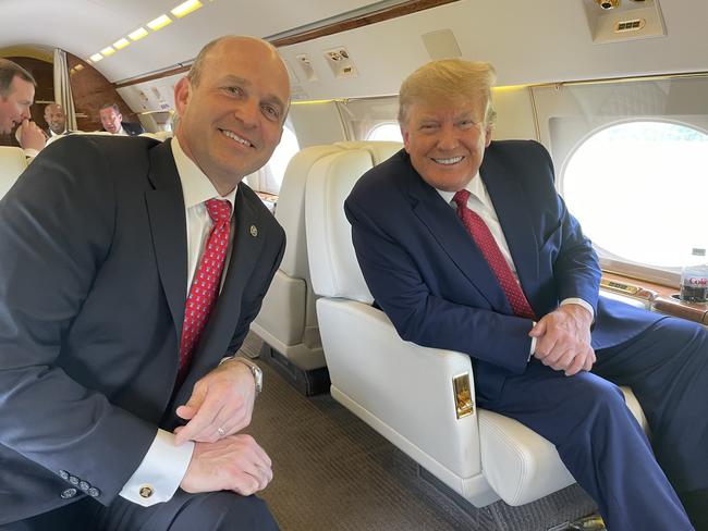 Heritage Foundation President Kevin Roberts with former president Donald Trump on a private plane in April 2022.