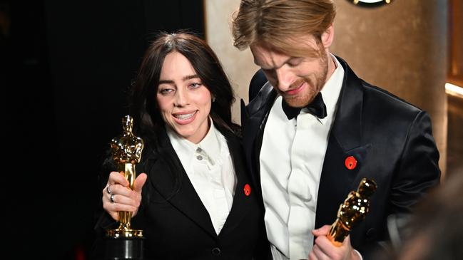 Oscar winners Billie Eilish and Finneas also wore the pins calling for a ceasefire. Picture: Richard Harbaugh/A.M.P.A.S. via Getty Images