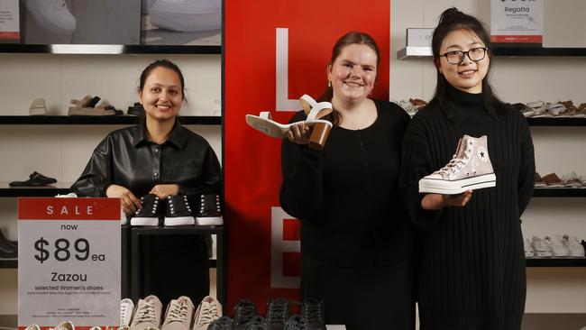 Myer team members Anjila Subedi, Alice Mummery and Cayla Lin in the shoe department.  Myer Stocktake Sale starts on Boxing Day.  Picture: Nikki Davis-Jones