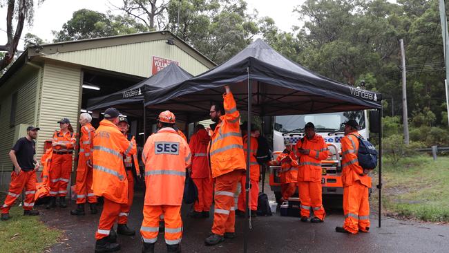 Volunteers from the SES joining the search for the teen after a cold, wet night. Picture: John Grainger