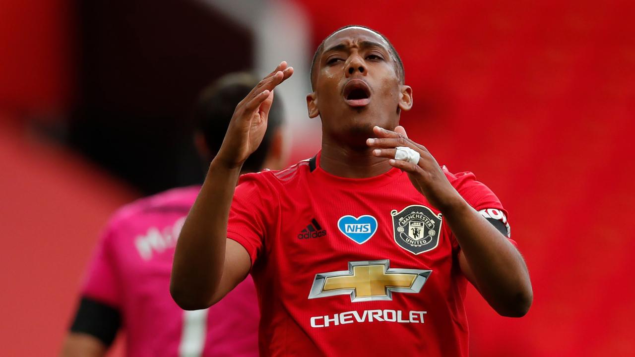 Manchester United's French striker Anthony Martial reacts after missing a chance during the English Premier League football match between Manchester United and Southampton at Old Trafford in Manchester, north-west England, on July 13, 2020. (Photo by Clive Brunskill / POOL / AFP) / RESTRICTED TO EDITORIAL USE. No use with unauthorised audio, video, data, fixture lists, club/league logos or 'live' services. Online in-match use limited to 120 images. An additional 40 images may be used in extra time. No video emulation. Social media in-match use limited to 120 images. An additional 40 images may be used in extra time. No use in betting publications, games or single club/league/player publications. /