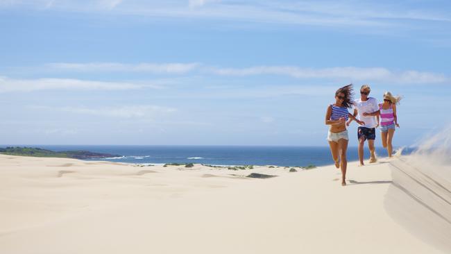 Port Stephens is home to pristine beaches, the rich Tomaree National Park, and the Stockton Sand Dunes.