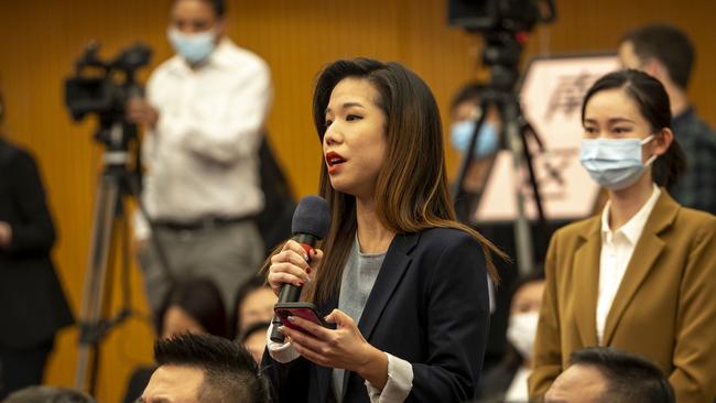 A journalist asks a question to Chinese Foreign Minister Wang Yi in Beijing on Monday night. Picture: Getty Images