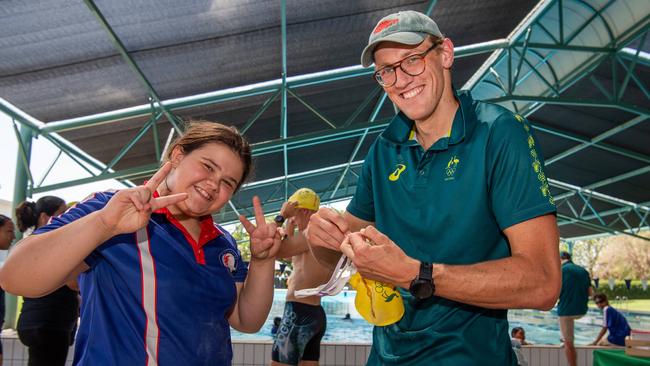 Lawkatah Williams and Mack Horton as Olympians and scholarship coaches run training sessions for Katherine youth at RAAF Base Tindal. Picture: Pema Tamang Pakhrin