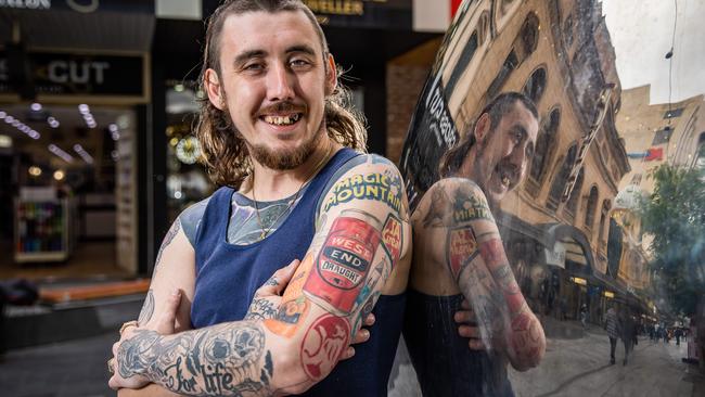 Holden has its pride of place on SA's most patriotic resident Josh Arbon who is covered in tattoos, on September 30th, 2021, at Rundle Mall. Picture: Tom Huntley