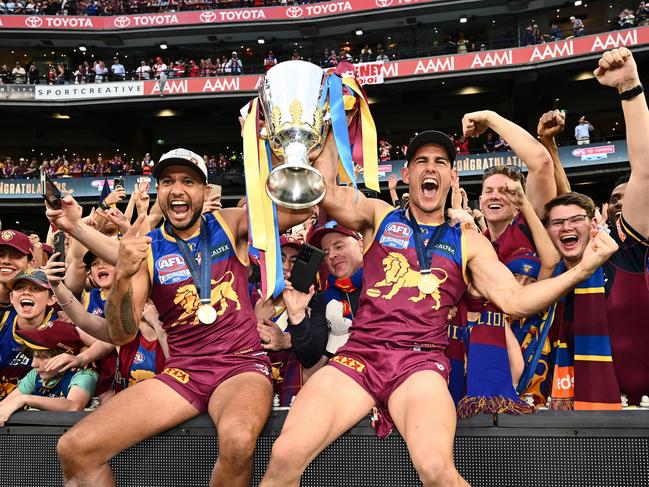 Callum Ah Chee and Brandon Starcevich celebrate with the fans. Picture: Quinn Rooney/Getty Images