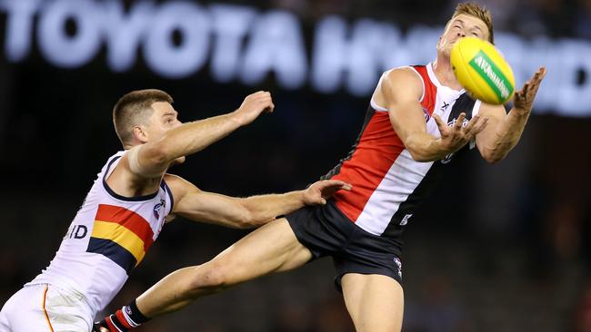 St Kilda’s Jack Newnes marks in front of Adelaide’s Bryce Gibbs. Picture: Michael Klein