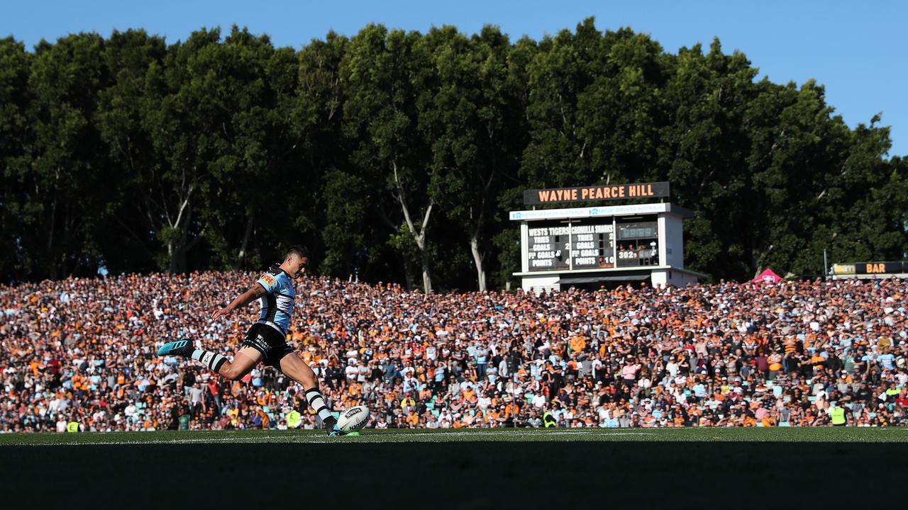 The NRL wants four new suburban grounds built in the next decade.