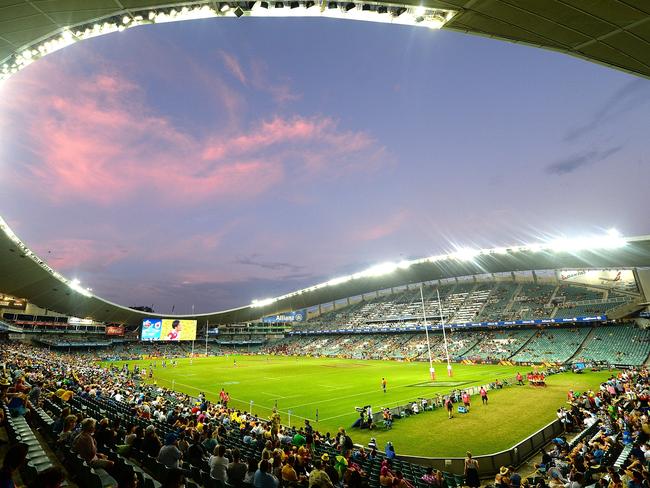 Inside Allianz Stadium at dusk during the 2017 HSBC Sydney Sevens. Picture: Bradley Kanaris/Getty Images