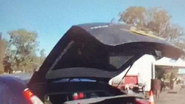 A 40-year-old man, wanted by police, was found hiding in the boot of a car, near Texas. Picture: qps