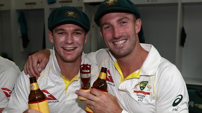 Peter Handscomb and Shaun Marsh celebrate after Australia regained the Ashes.