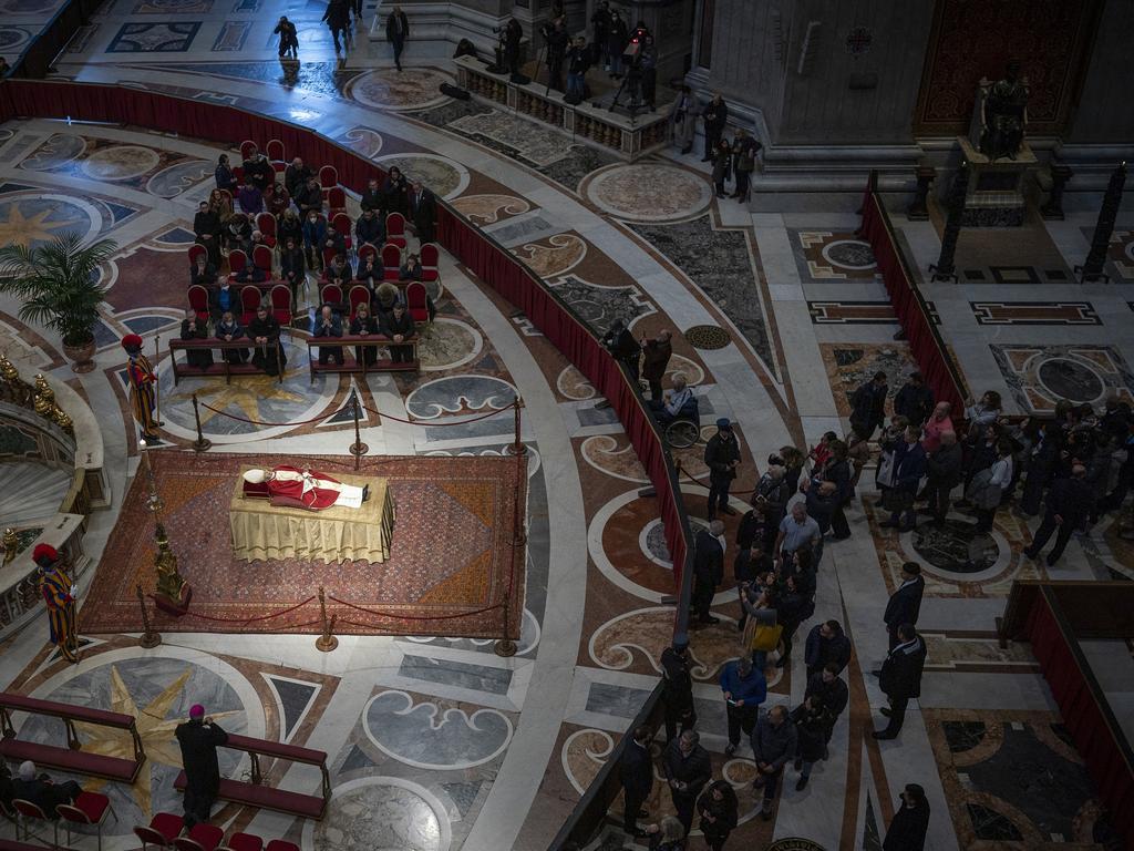 The body of Pope Emeritus Benedict XVI lies in state at St. Peter's Basilica, in the Vatican. Picture: Christopher Furlong/Getty Images