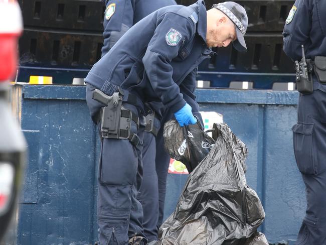 Police search Corrimal train station after Ms Powell’s body was discovered. Picture: John Grainger.