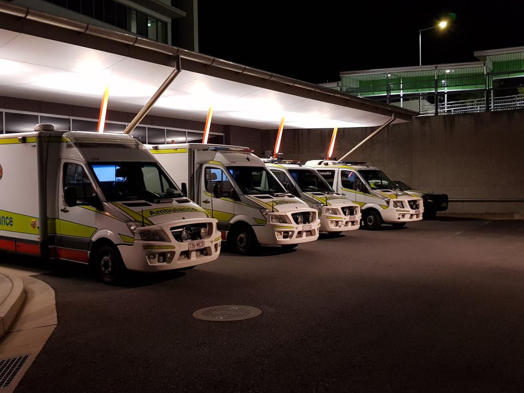 LINED UP: Five ambulance vehicles were photographed at the Rockhampton Hospital around the time that a patient was advised they were all tied up.