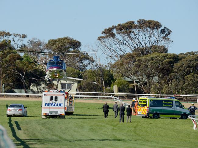 Emergency teams tend to the injured at Murray Bridge. Picture: SAM WUNDKE