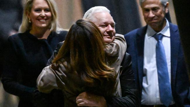 WikiLeaks founder Julian Assange hugs his wife, Stella Assange, after arriving at Canberra Airport on June 26. Picture: William West/AFP