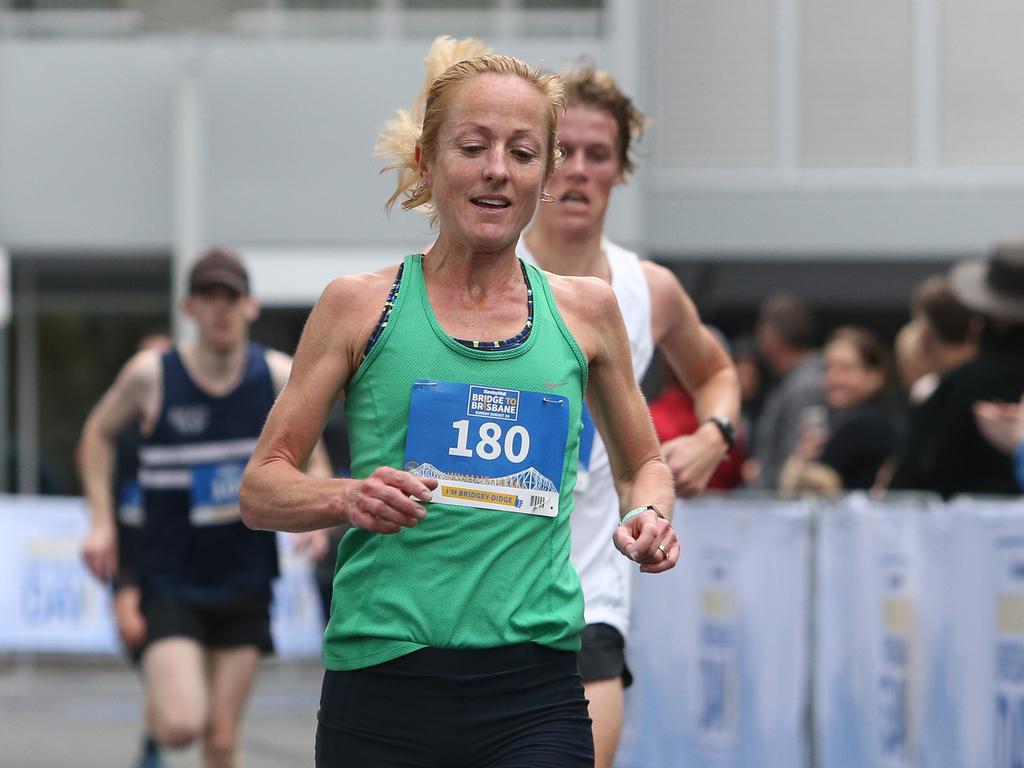 <p>Belinda Martin, winner of the women's 10 klm in the Bridge to Brisbane race. Sunday, August 26, 2018 (AAP Image/Richard Waugh)</p>