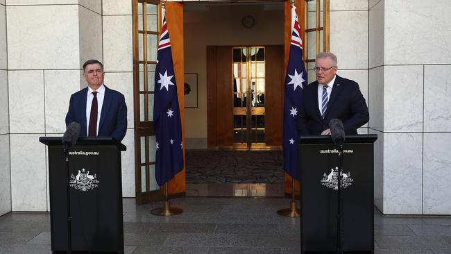 Prime Minister Scott Morrison with professor Brendan Murphy during today’s press conference in Parliament House, Canberra. Picture: Gary Ramage